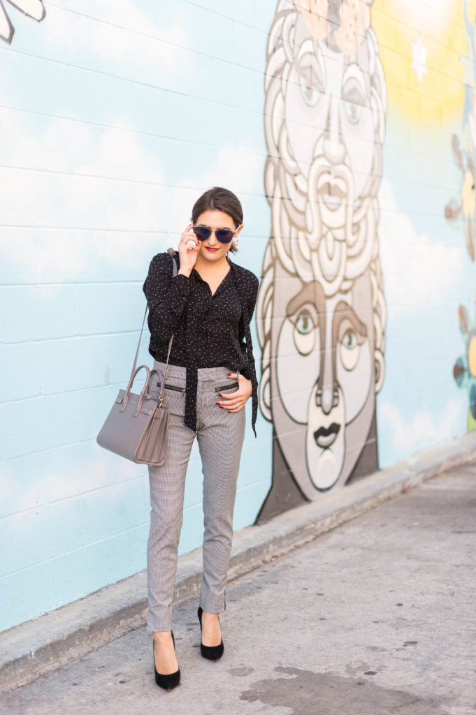 Lifestyle and Corporate blogger Amanda Warsavsky wearing Veronica Beard check pants and a Banana Republic dot blouse