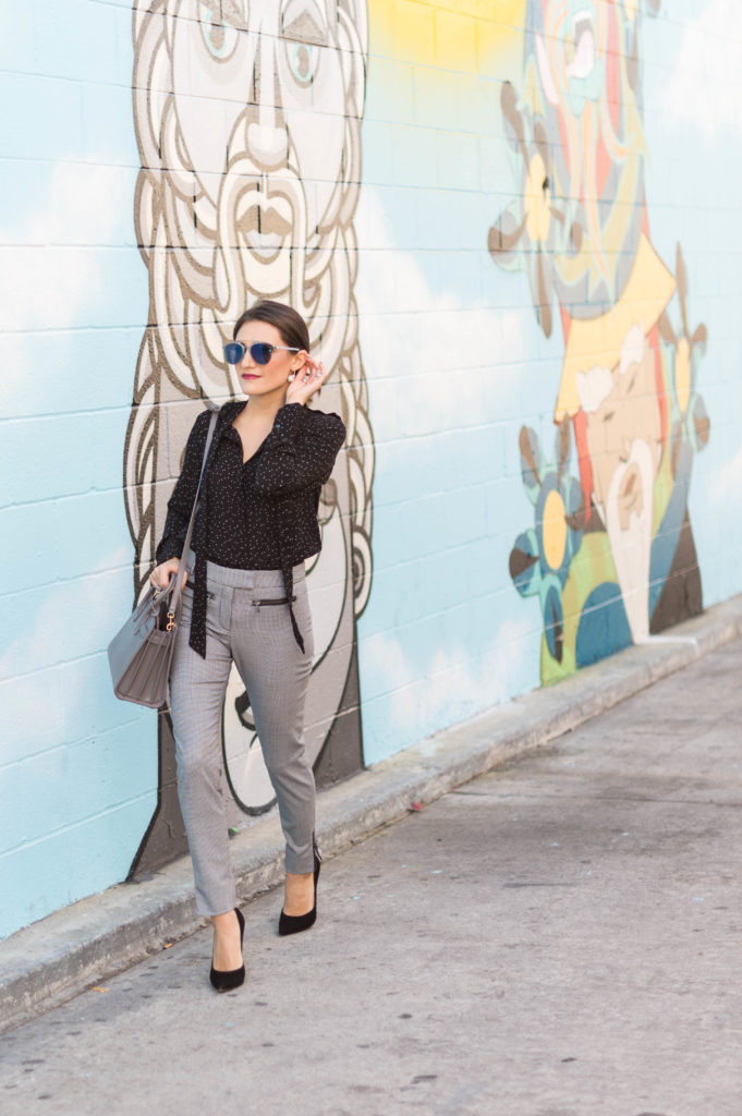 Lifestyle and Corporate blogger Amanda Warsavsky wearing Veronica Beard check pants and a Banana Republic dot blouse