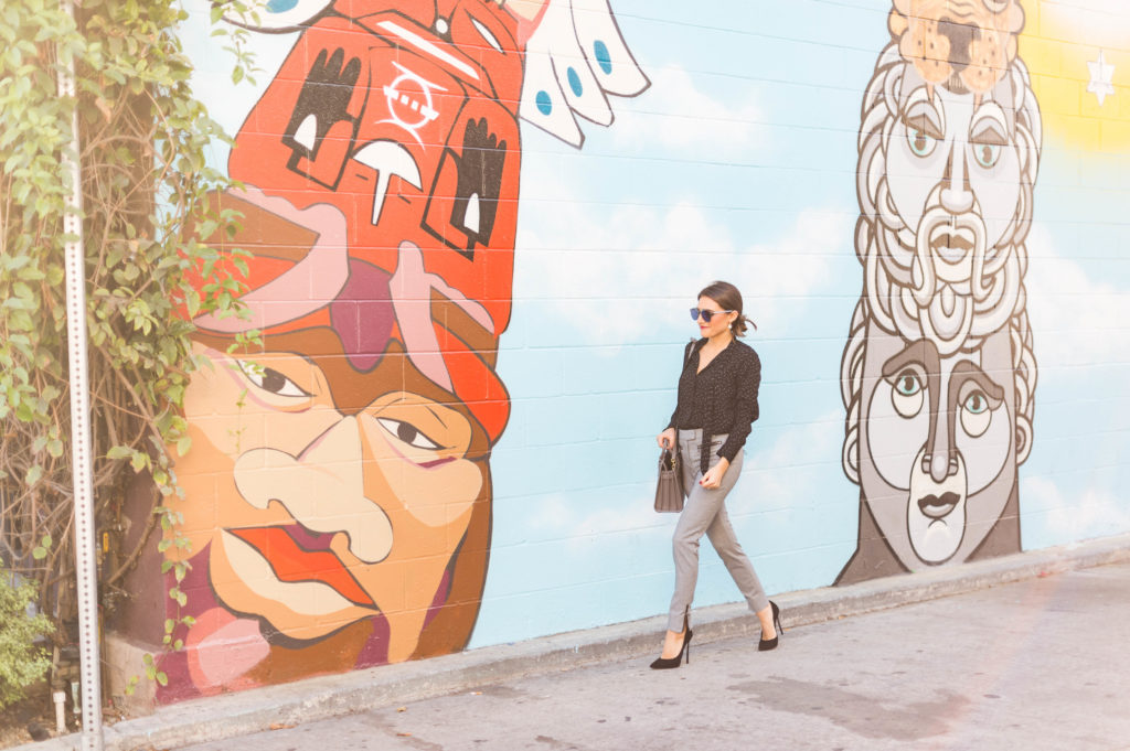 Lifestyle and Corporate blogger Amanda Warsavsky wearing Veronica Beard check pants and a Banana Republic dot blouse