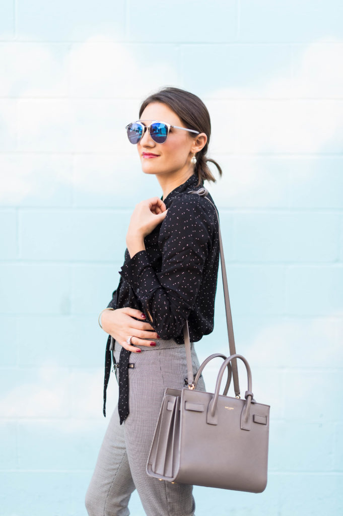 Lifestyle and Corporate blogger Amanda Warsavsky wearing Veronica Beard check pants and a Banana Republic dot blouse