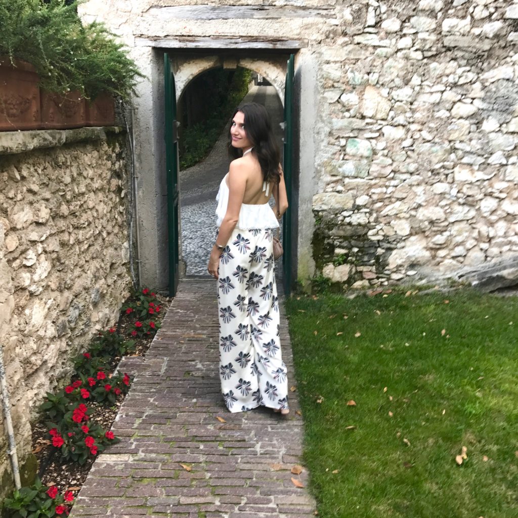 That Pencil Skirt wearing Alexis Silk pants and an Alice and Olivia halter top in Lake Garda