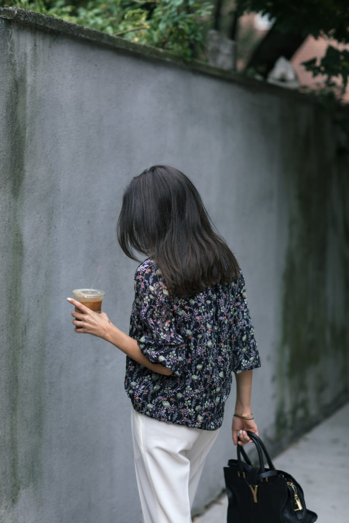 Lifestyle and work style blogger That Pencil Skirt wearing Dylan Gray off white crop trousers and a Rebecca Taylor floral smock neck blouse