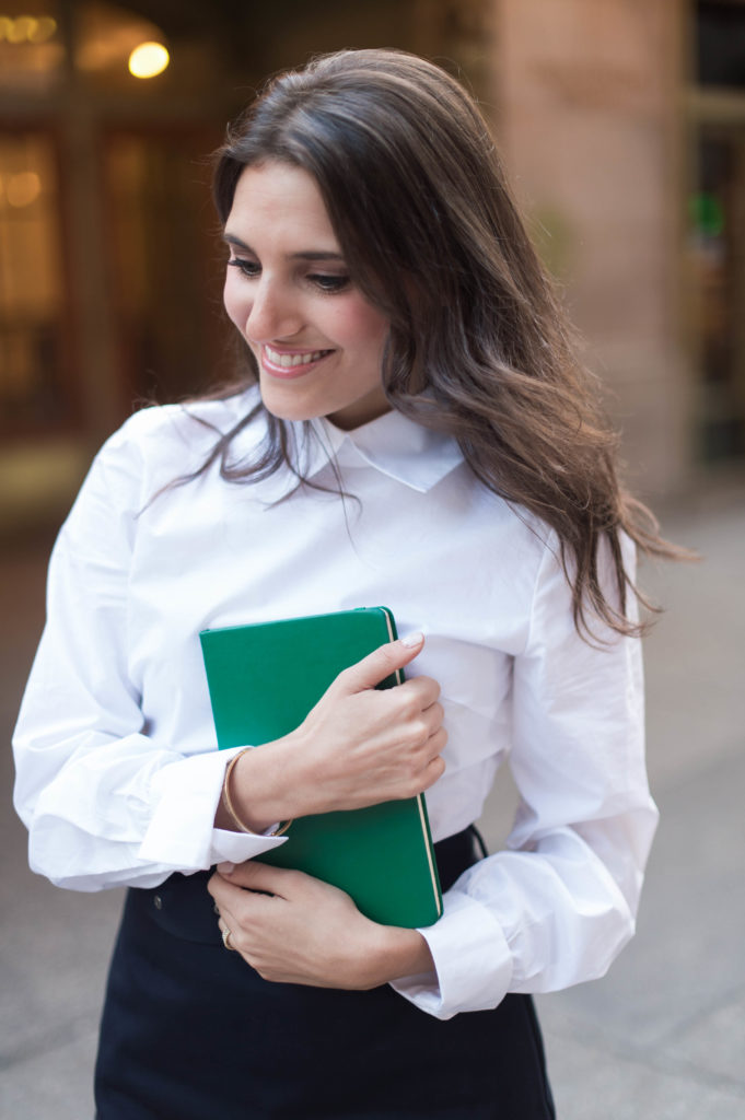 Lifestyle and work style blogger That Pencil Skirt wearing a Sea combo dress with a white button down top and belted skirt