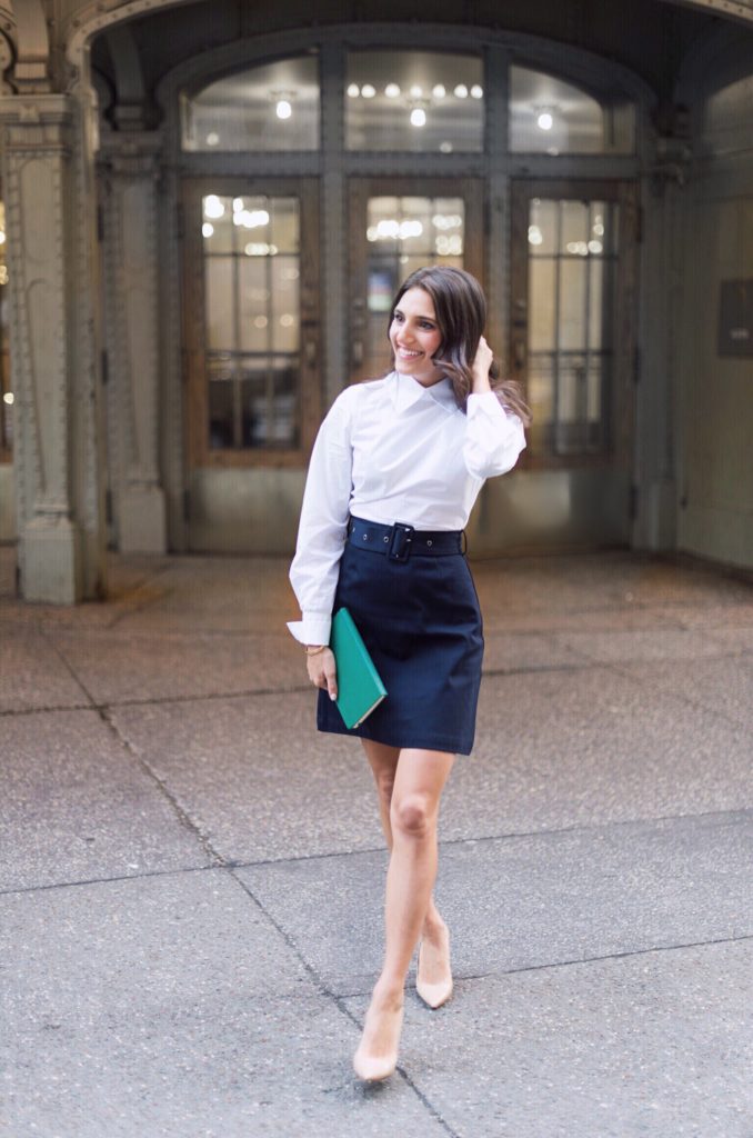 Lifestyle and work style blogger That Pencil Skirt wearing a Sea combo dress with a white button down top and belted skirt