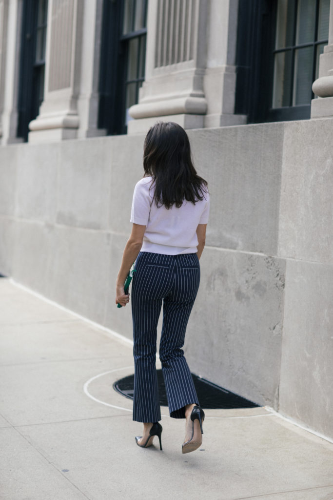 Lifestyle and work wear inspiration blogger That Pencil Skirt wearing Derek Lam crop pinstripe stretch pants, an embellished Miu Miu belt and a short sleeve white cashmere sweater