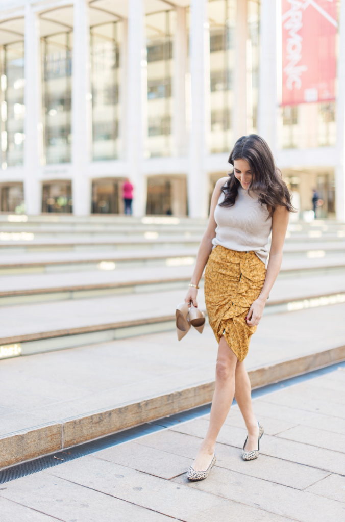 Work style blogger That Pencil Skirt wearing a Veronica Beard yellow ruched skirt and Rothy's leopard pointed flats