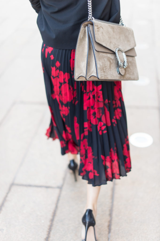 Lifestyle and work wear inspiration blogger That Pencil Skirt wearing an H&M red and navy pleated midi skirt and beige Gucci Dionysus bag
