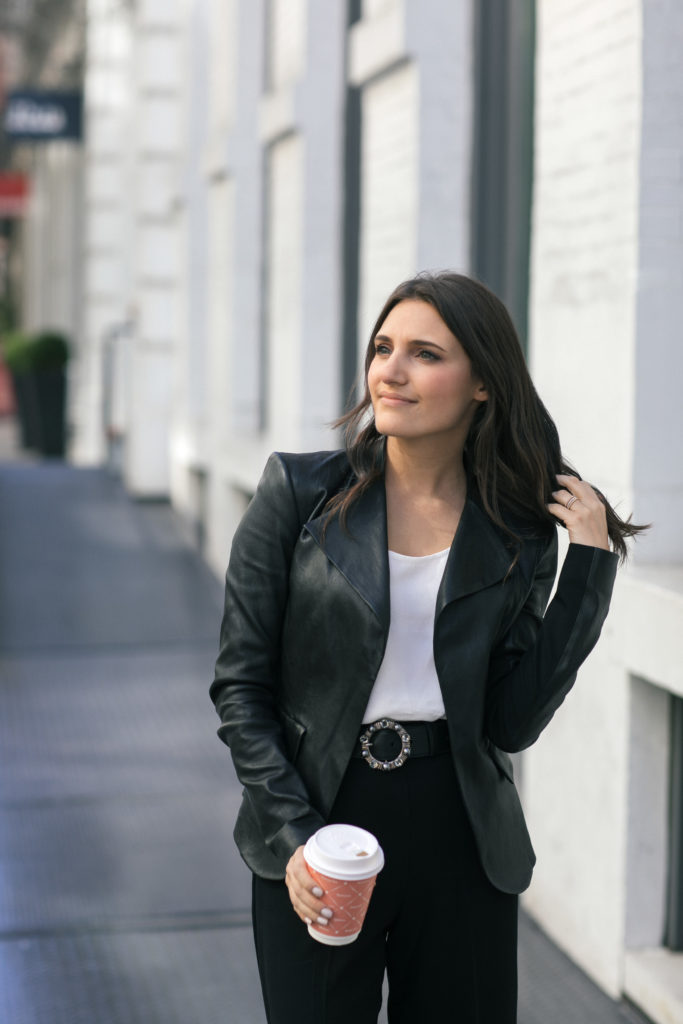 Lifestyle and work wear blogger That Pencil Skirt wearing a Theory peplum leather jacket, Miu Miu embellished belt and wide leg black pants