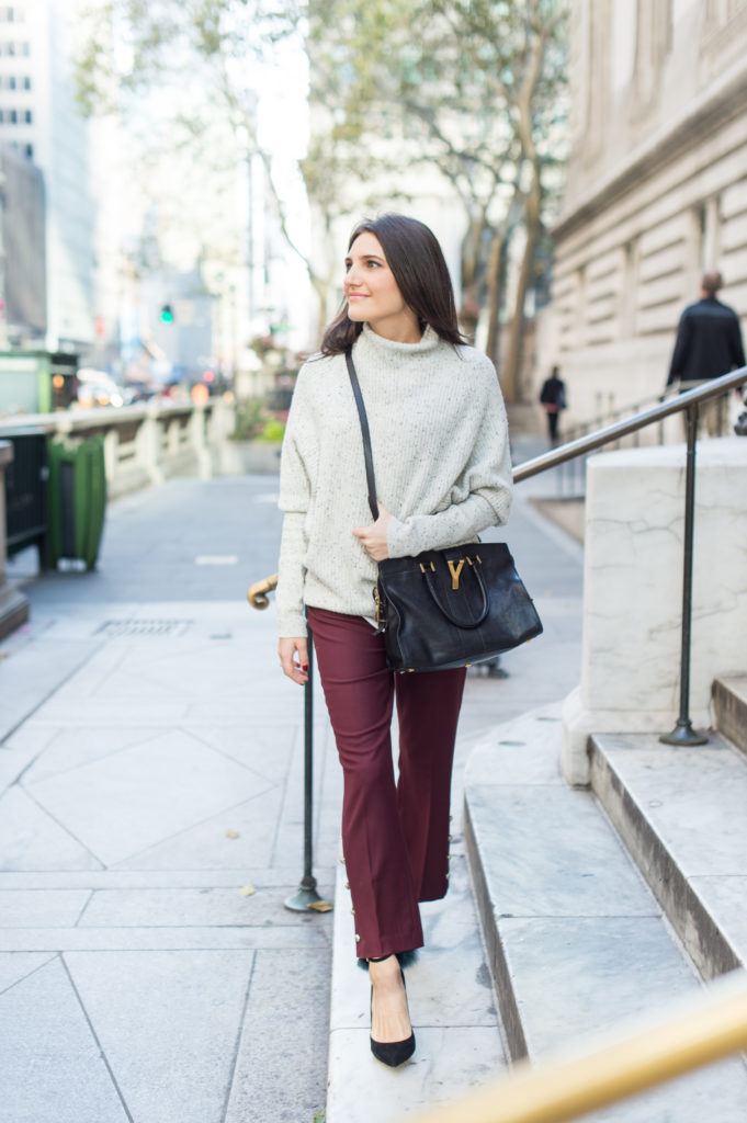Lifestle and Work wear blogger That Pencil Skirt wearing red crop Club Monaco pants with a grey Club Monaco dot sweater and a Saint Laurent small cabas bag