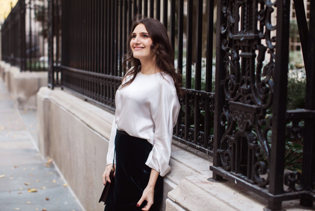 That Pencil Skirt, a lifestyle and workwear blogger wearing a Vince Velvet midi skirt with a Vince silk silver blouse 