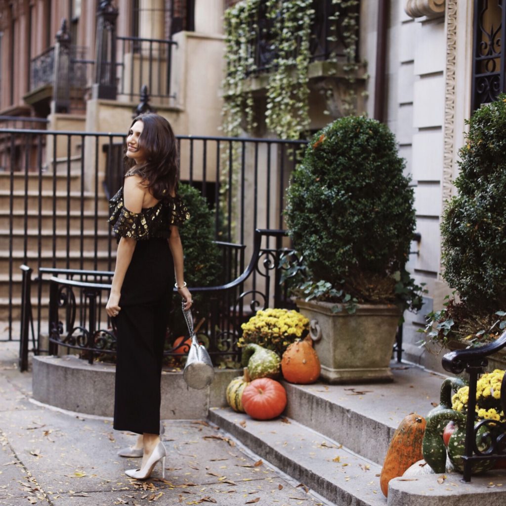 Lifestyle and work wear inspiration blogger That Pencil Skirt wearing a Veronica Beard metallic off the shoulder top with wide leg crop black trousers and a jerome dreyfus silver popeye bucket bag