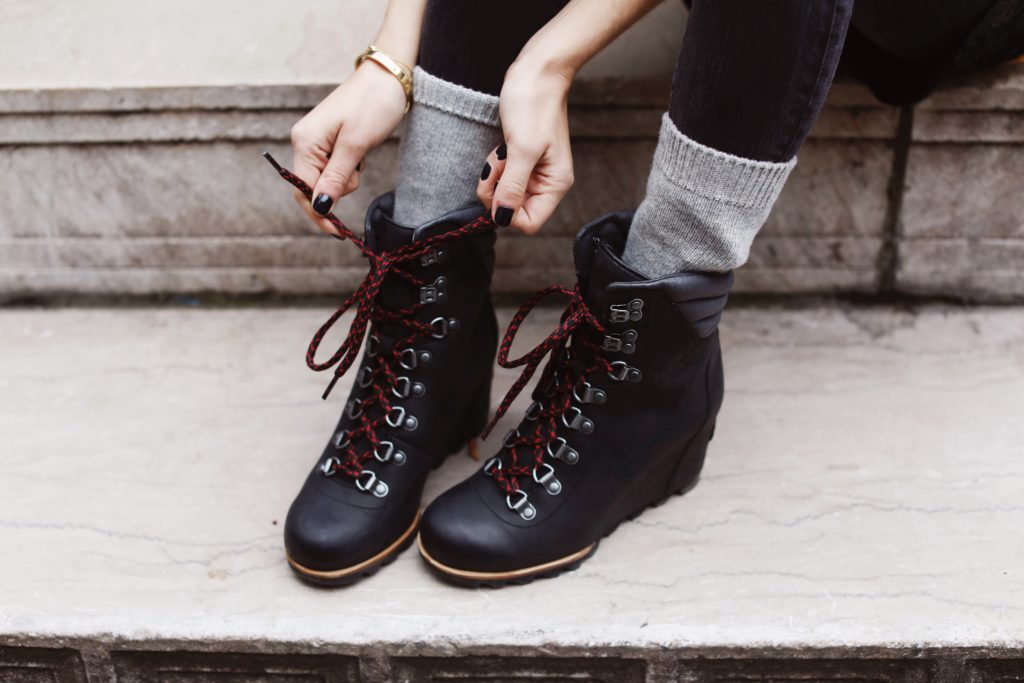 Lifestyle blogger That Pencil Skirt wearing black wedge sorel lace up boots with red laces and gray cashmere Bloomingdale's socks