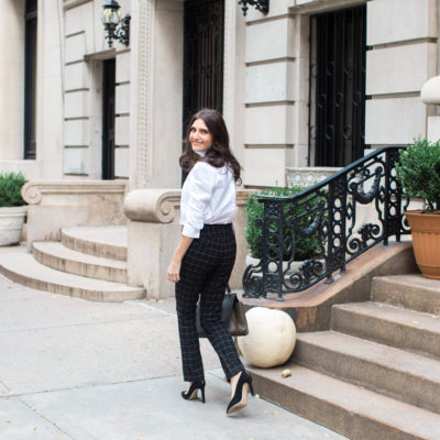 Lifestyle and workwear blogger That Pencil Skirt wearing a Frame ruffle collar Victorial blouse, Alice and Olicia Stacy windowpane pants, a Celine bag and black suede pointed toe Jimmy Choo pumps